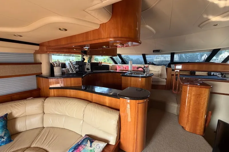 Slide: The Image of Luxurious interior of 2004 Neptunus 56 Flybridge yacht with elegant wood finishes. - 22
