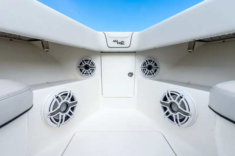 Slide: The Image of 2023 SeaVee 370Z boat interior with speakers and storage compartment. - 37