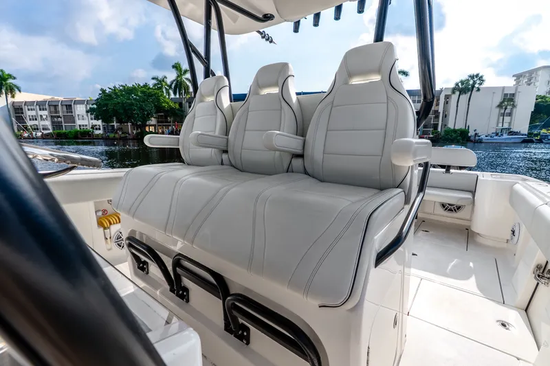Slide: The Image of Luxury seating on 2023 SeaVee 370Z boat, featuring sleek design and waterfront view. - 44