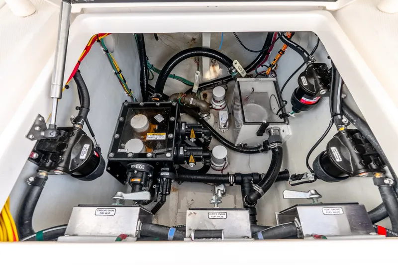 Slide: The Image of Engine compartment of 2023 SeaVee 370Z boat with visible fuel system components. - 57