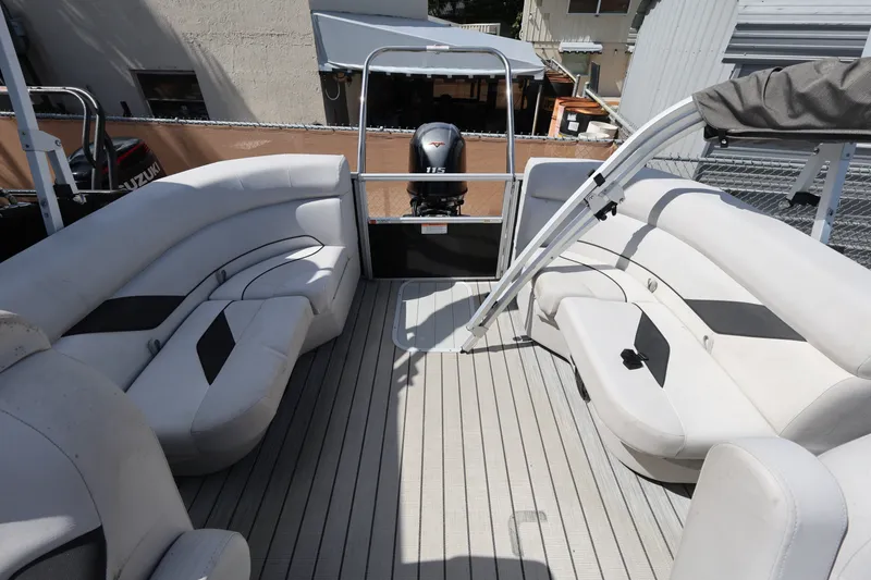 Slide: The Image of 2023 SunCatcher Select 320 RC pontoon boat interior with spacious seating and modern design. - 13