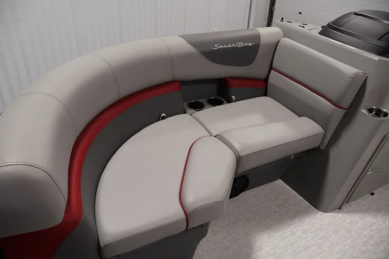Slide: The Image of 2023 South Bay S222RS boat interior with gray and red seating. - 12