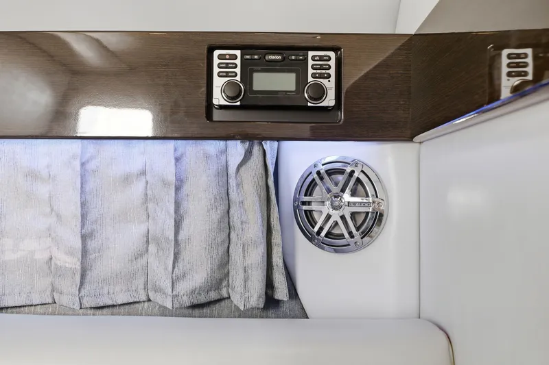 Slide: The Image of 2016 Formula 330 Crossover Bowrider interior with audio system and speaker. - 48