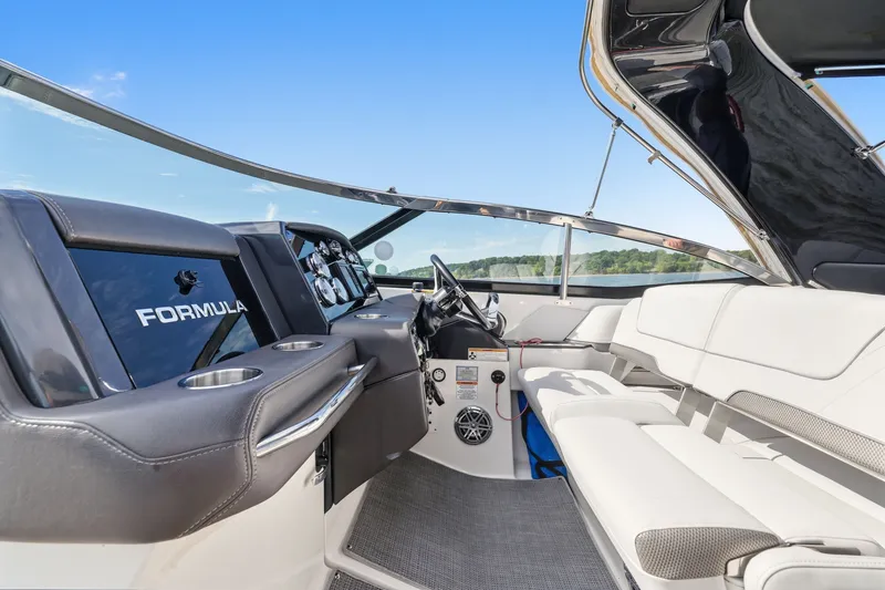 Slide: The Image of 2016 Formula 330 Crossover Bowrider interior with sleek design and comfortable seating. - 34