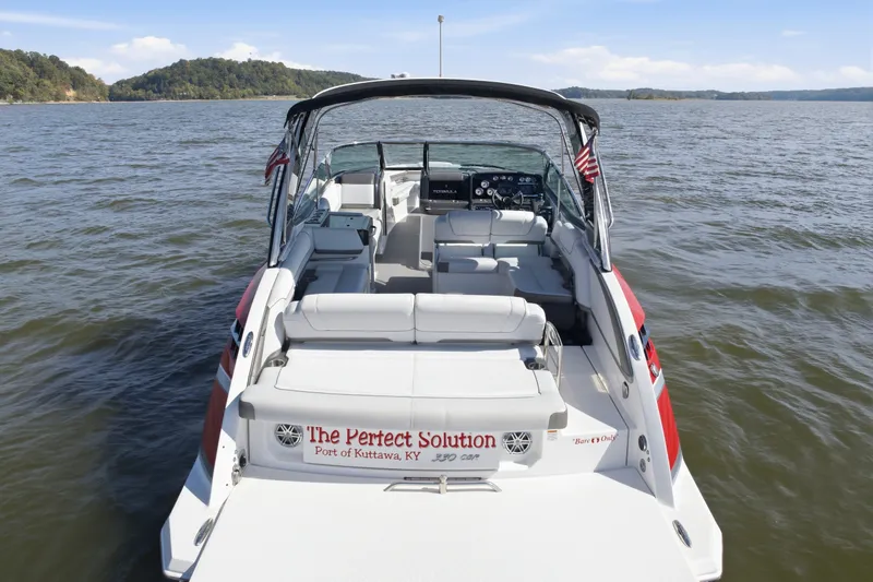 Slide: The Image of 2016 Formula 330 Crossover Bowrider on water, rear view, "The Perfect Solution" text visible. - 11