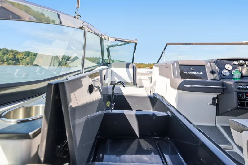 Slide: The Image of 2016 Formula 330 Crossover Bowrider interior with sleek design and modern amenities. - 38