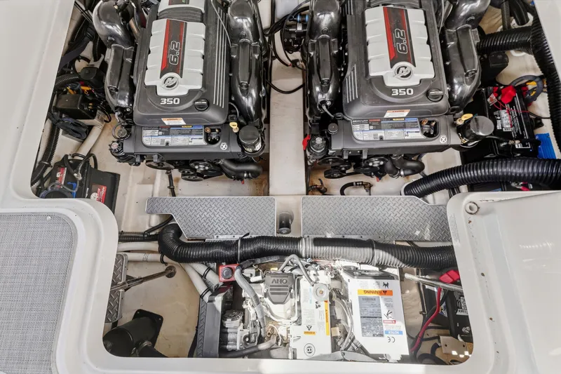 Slide: The Image of Engine compartment of a 2016 Formula 330 Crossover Bowrider with dual 6.2L 350 engines. - 56