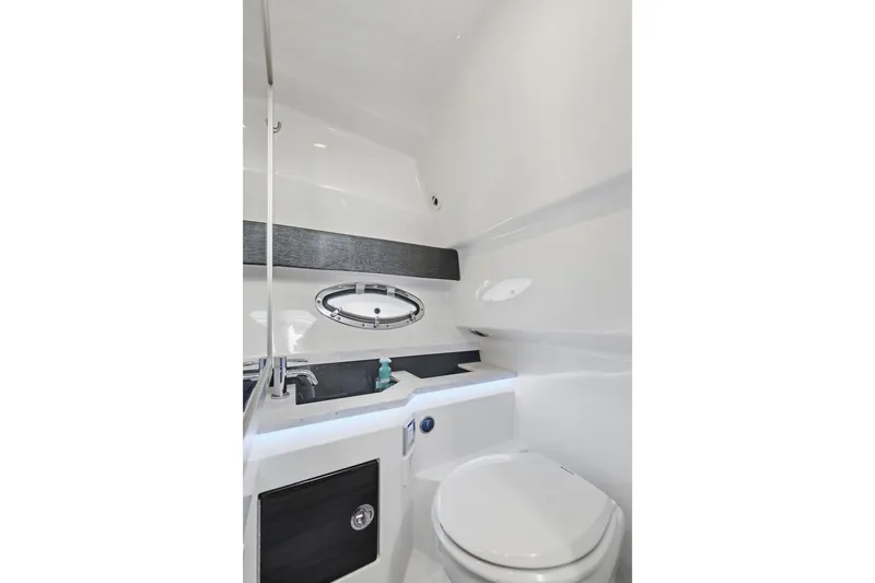 Slide: The Image of 2016 Formula 330 Crossover Bowrider bathroom with sleek design and modern fixtures. - 52