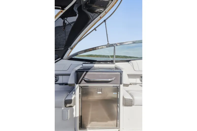 Slide: The Image of 2016 Formula 330 Crossover Bowrider interior with stainless steel cabinet and seating. - 44