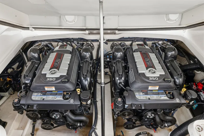Slide: The Image of Twin 6.2L 350 engines in a 2016 Formula 330 Crossover Bowrider boat. - 55