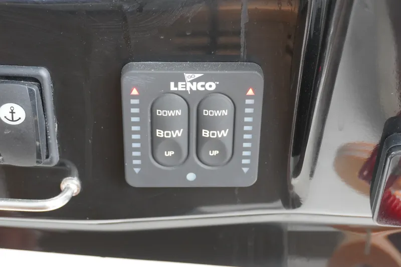 Slide: The Image of Lenco trim tab control panel on 2024 Jeanneau NC Sport 895 boat. - 21