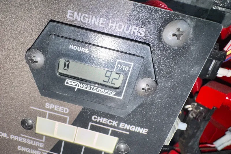 Slide: The Image of Engine hour meter displaying 9.2 hours on a 2024 Jeanneau NC Sport 895 boat. - 42