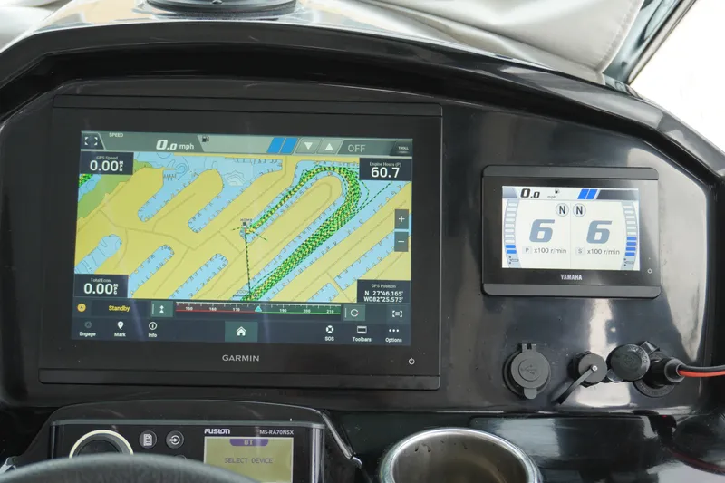 Slide: The Image of Dashboard of 2024 Jeanneau NC Sport 895 with Garmin navigation display. - 38