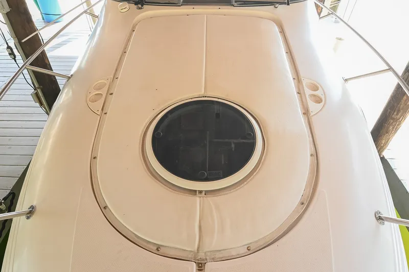Slide: The Image of 2007 Regal Commodore 2665 boat deck with circular hatch and railing. - 41