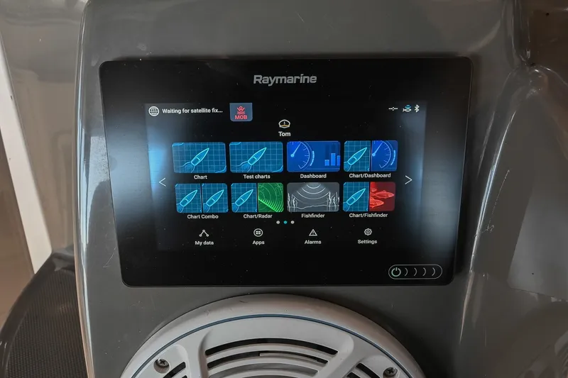 Slide: The Image of Raymarine navigation display on 2007 Regal Commodore 2665 boat, showing charts and settings. - 19