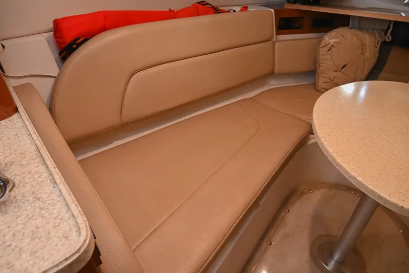 Slide: The Image of 2007 Regal Commodore 2665 interior with beige seating and table. - 30