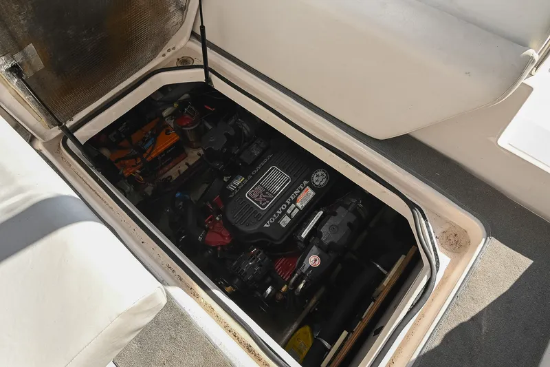 Slide: The Image of Engine compartment of a 2007 Regal Commodore 2665 boat, featuring a Volvo Penta engine. - 45