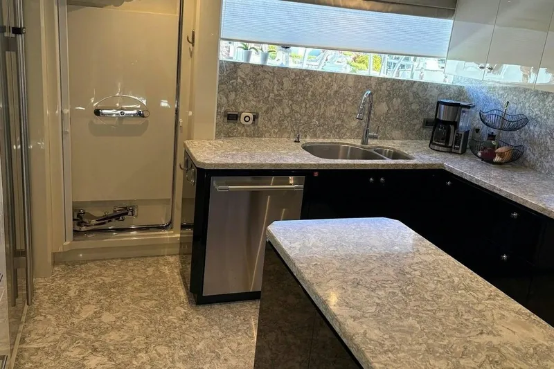 Slide: The Image of Luxurious kitchen interior of 2020 Ocean Alexander 100 Skylounge Megayacht with marble countertops. - 5