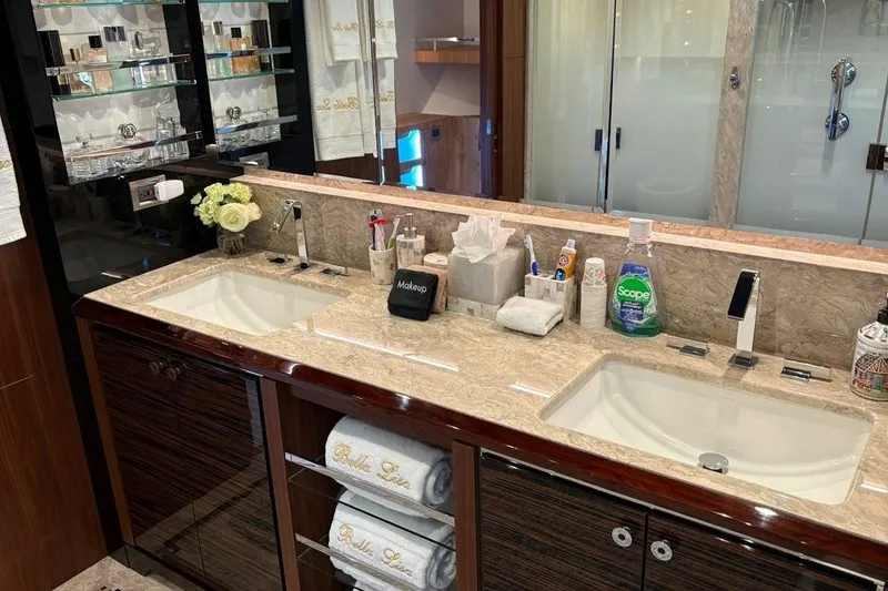 Slide: The Image of Luxurious bathroom in 2020 Ocean Alexander 100 Skylounge Megayacht with dual sinks and elegant decor. - 12