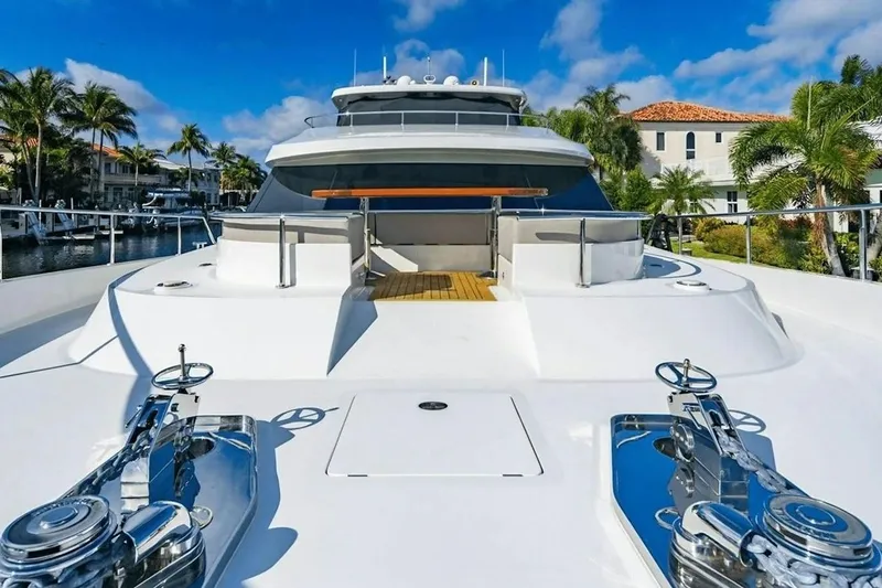 Slide: The Image of 2020 Ocean Alexander 100 Skylounge Megayacht docked, showcasing sleek design and luxury features. - 38