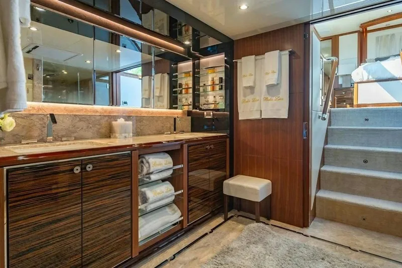 Slide: The Image of Luxurious bathroom in 2020 Ocean Alexander 100 Skylounge Megayacht with elegant wood finishes. - 11