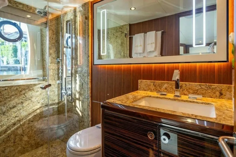 Slide: The Image of Luxurious bathroom in 2020 Ocean Alexander 100 Skylounge Megayacht with marble and wood finishes. - 19