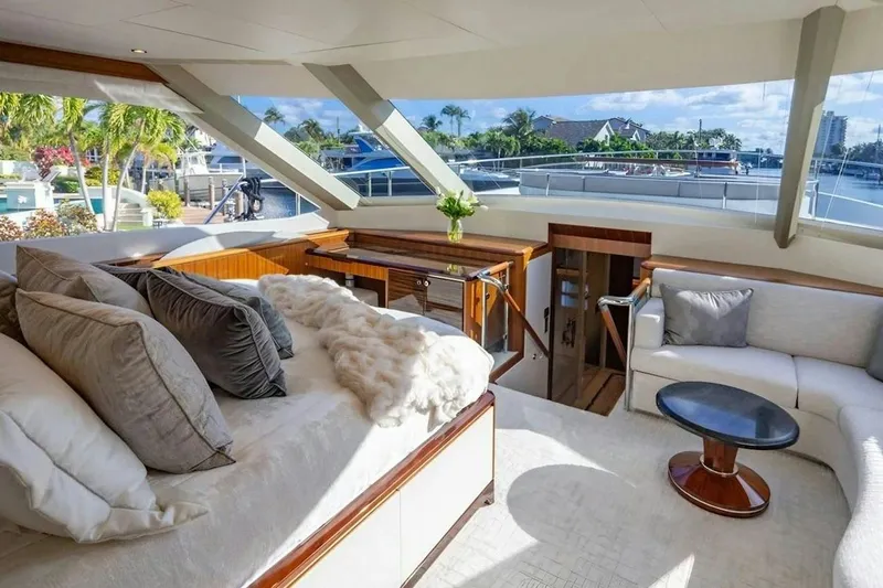 Slide: The Image of Luxurious interior of 2020 Ocean Alexander 100 Skylounge Megayacht with plush seating and scenic views. - 8