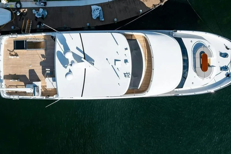 Slide: The Image of Top view of 2020 Ocean Alexander 100 Skylounge Megayacht docked at marina. - 37