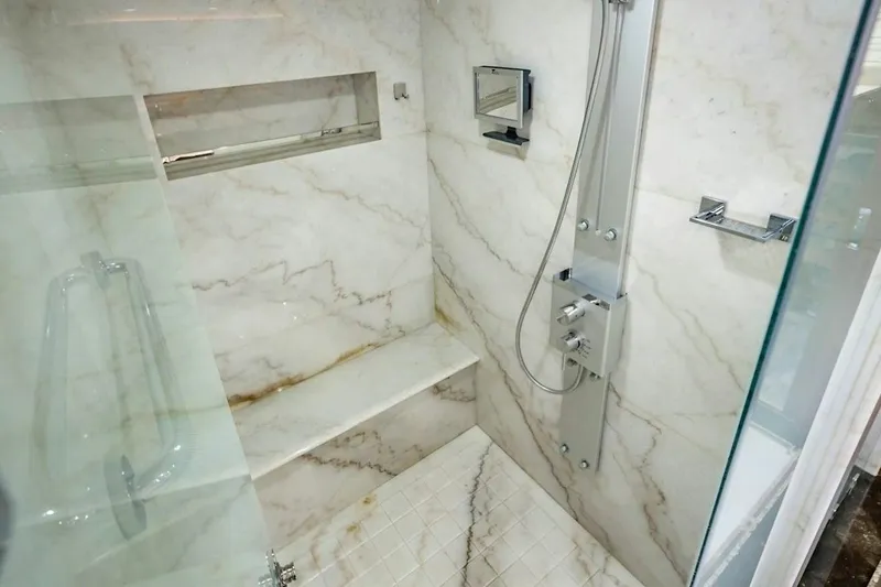 Slide: The Image of Luxurious marble shower in 2020 Ocean Alexander 100 Skylounge Megayacht bathroom. - 13