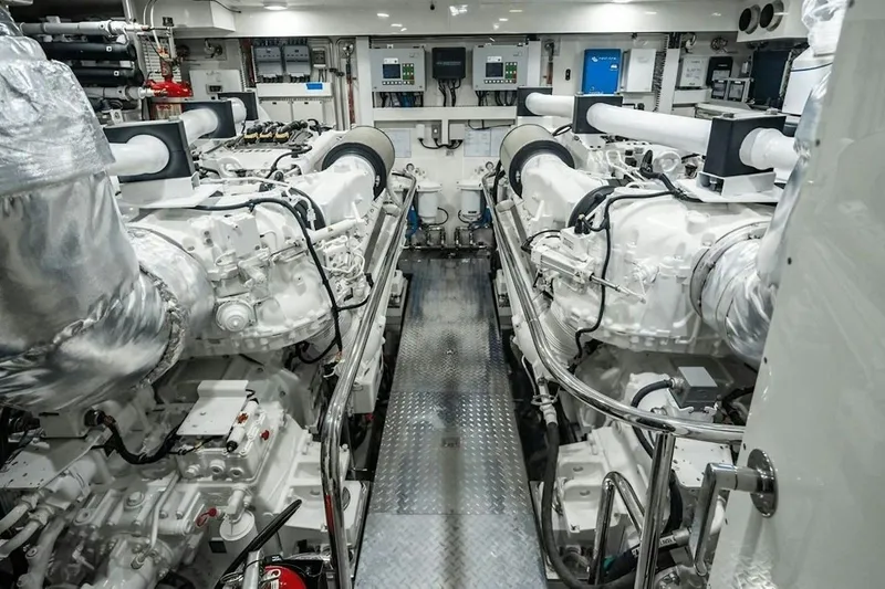 Slide: The Image of Engine room of 2020 Ocean Alexander 100 Skylounge Megayacht, showcasing advanced machinery. - 28