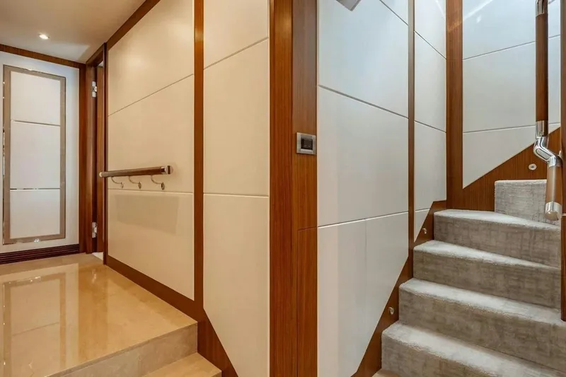 Slide: The Image of Luxurious interior of 2020 Ocean Alexander 100 Skylounge Megayacht with elegant staircase. - 15