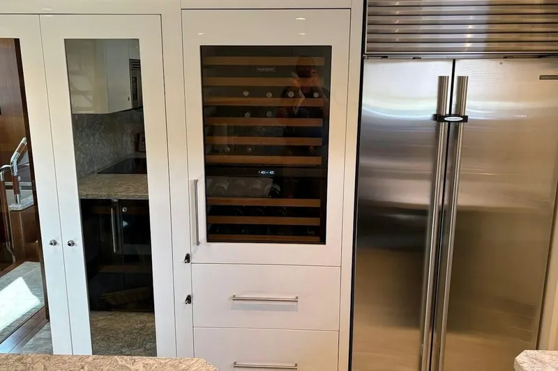 Slide: The Image of Luxurious kitchen interior of 2020 Ocean Alexander 100 Skylounge Megayacht with modern appliances. - 6