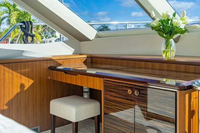 Slide: The Image of Luxurious interior of 2020 Ocean Alexander 100 Skylounge Megayacht with elegant wood finish. - 9