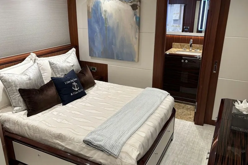 Slide: The Image of Luxurious bedroom in 2020 Ocean Alexander 100 Skylounge Megayacht with elegant decor and ensuite bathroom. - 18