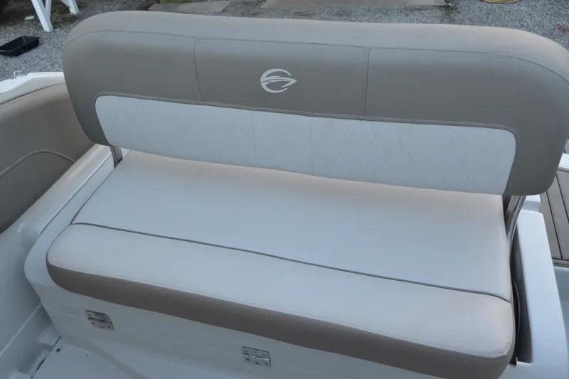 Slide: The Image of 2024 Crownline 270 CR boat seat with beige and white upholstery. - 8