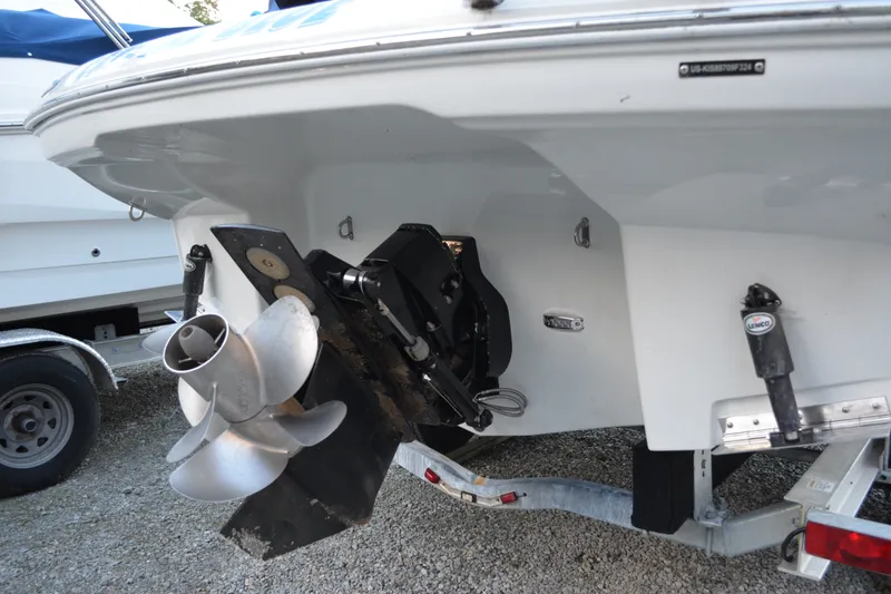 Slide: The Image of 2024 Crownline 270 CR boat stern with propeller and trailer detail. - 5