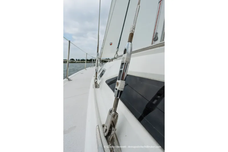 Slide: The Image of Close-up of a 2003 Catalina 380 sailboat deck with rigging details. - 15