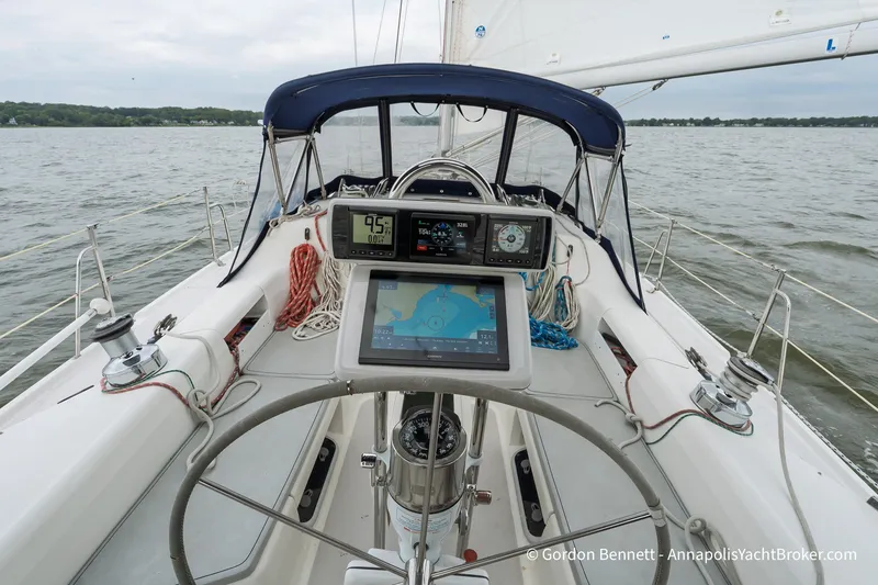 Slide: The Image of Cockpit view of a 2003 Catalina 380 sailboat with navigation instruments. - 1