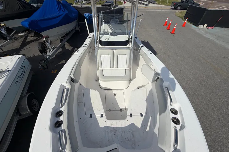 Slide: The Image of 2020 Sea Fox 228 Commander boat interior with seating and storage compartments. - 14