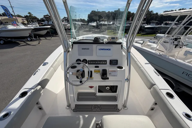 Slide: The Image of 2020 Sea Fox 228 Commander boat console with steering wheel and navigation equipment. - 10