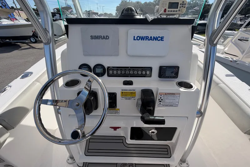 Slide: The Image of 2020 Sea Fox 228 Commander boat console with steering wheel and navigation equipment. - 11