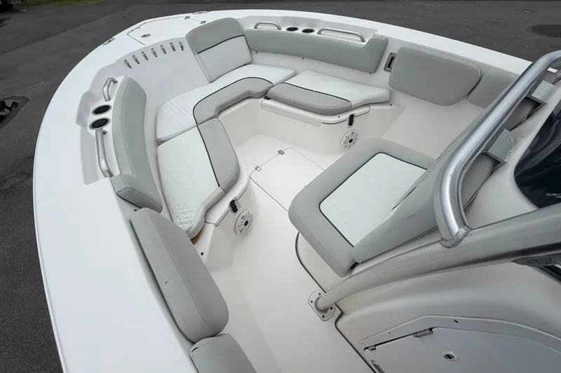 Slide: The Image of 2020 Sea Fox 228 Commander boat interior with cushioned seating and cup holders. - 38