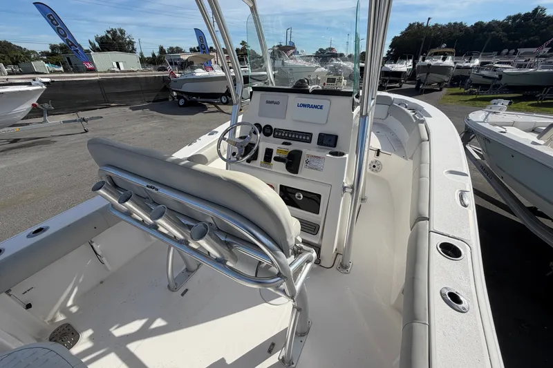 Slide: The Image of 2020 Sea Fox 228 Commander boat interior with steering console and seating. - 9