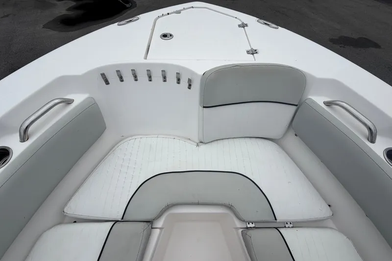 Slide: The Image of The image shows the bow area of a 2020 Sea Fox 228 Commander boat with cushioned seating. - 47