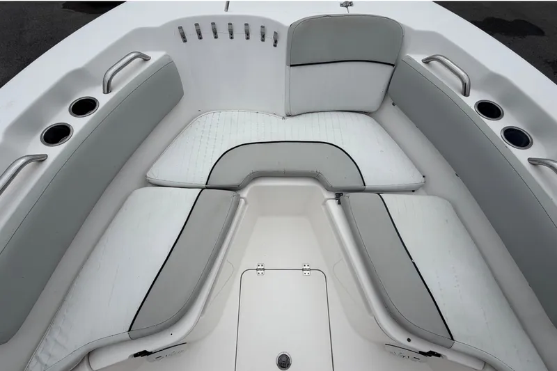 Slide: The Image of The 2020 Sea Fox 228 Commander features a spacious, cushioned seating arrangement in the bow area. - 40