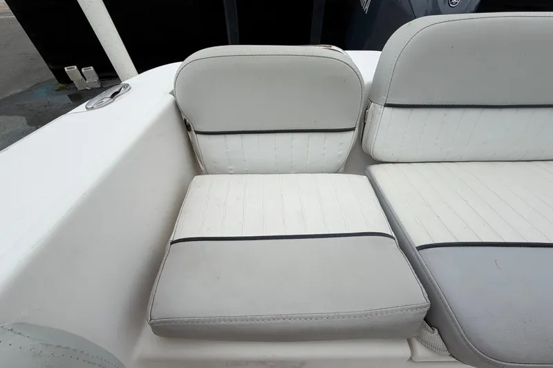 Slide: The Image of 2020 Sea Fox 228 Commander boat seating with white and gray upholstery. - 61