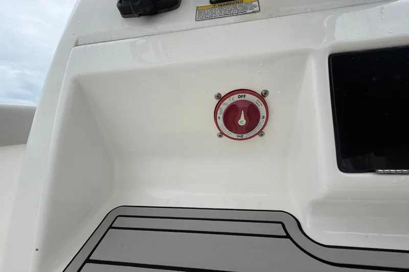 Slide: The Image of 2020 Sea Fox 228 Commander boat battery switch on deck, close-up view. - 32