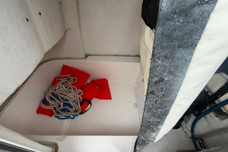 Slide: The Image of Storage compartment in a 2020 Sea Fox 228 Commander with ropes and life jackets. - 37