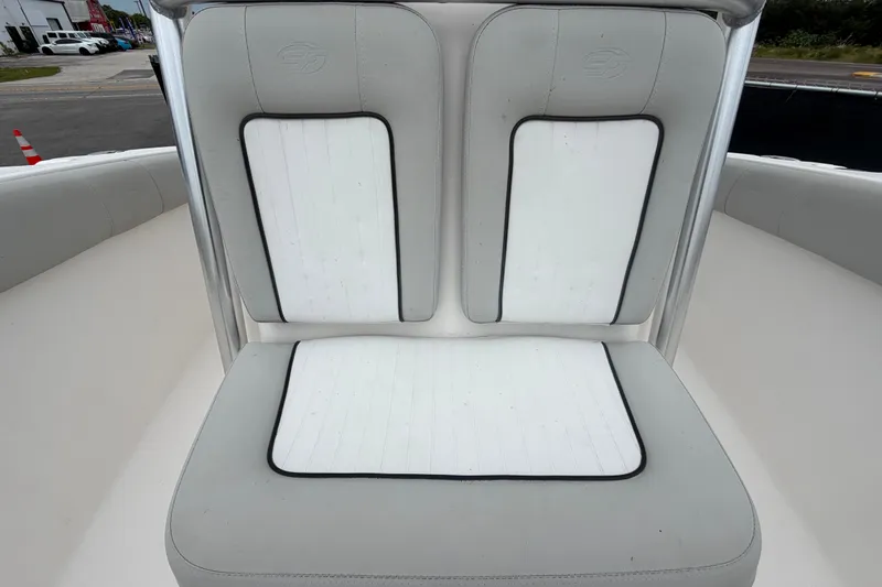 Slide: The Image of 2020 Sea Fox 228 Commander boat seating with white and gray cushions. - 54