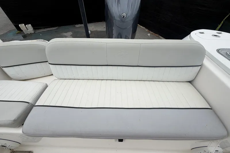 Slide: The Image of 2020 Sea Fox 228 Commander boat seating with gray and white upholstery. - 63